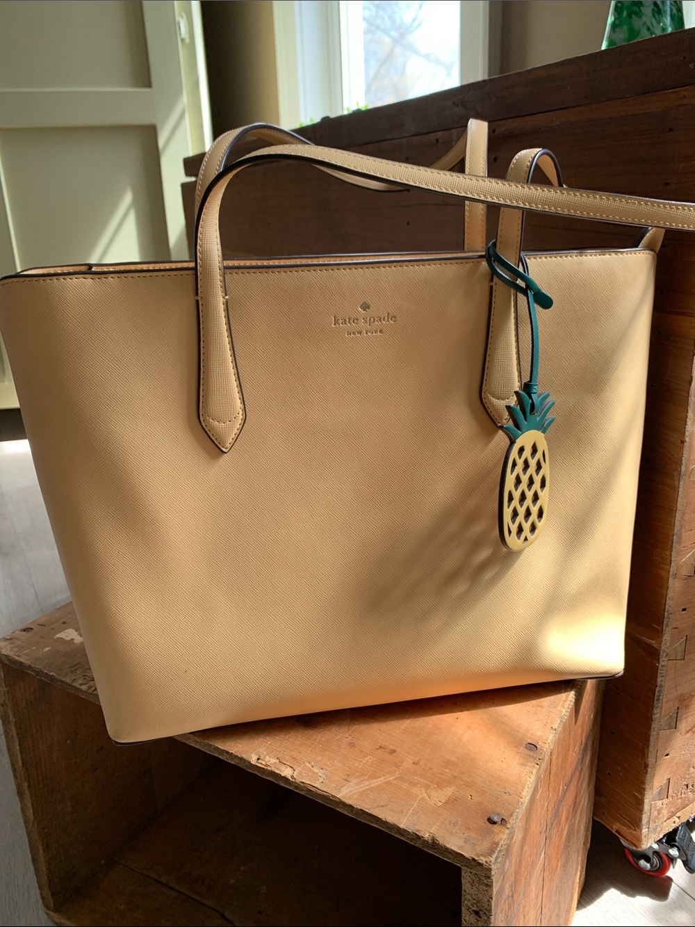 kate spade yellow leather tote with pineapple charm